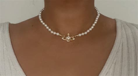 necklace with pearls and saturn|saturn necklace vivienne westwood.